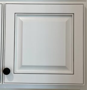A white cabinet door with medium gray pinstriping