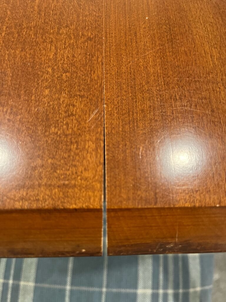 A table with a crack caused by low humidity